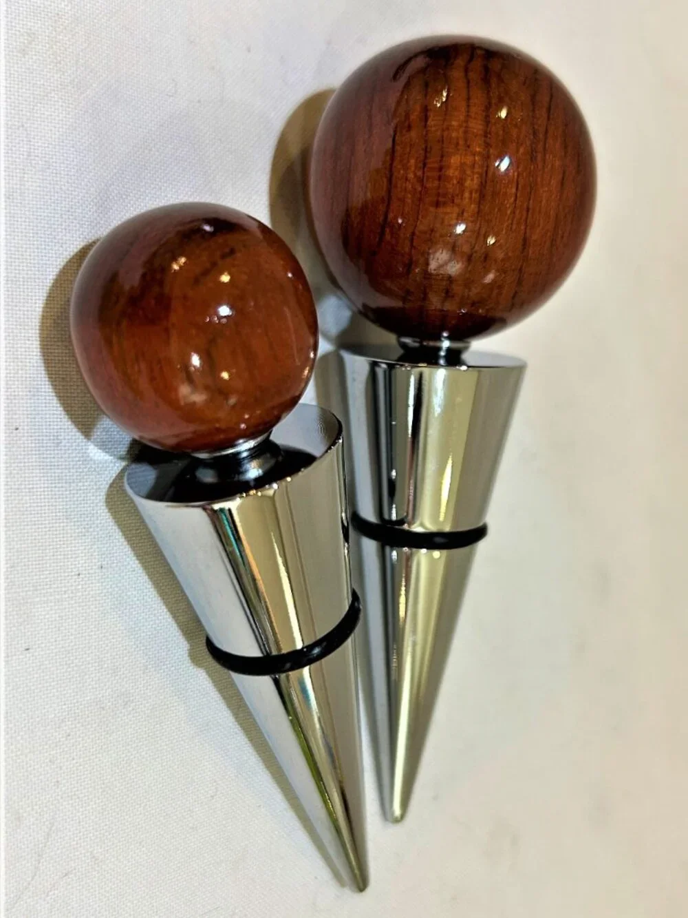 Pair of Brookstone Rosewood Wine Stoppers
